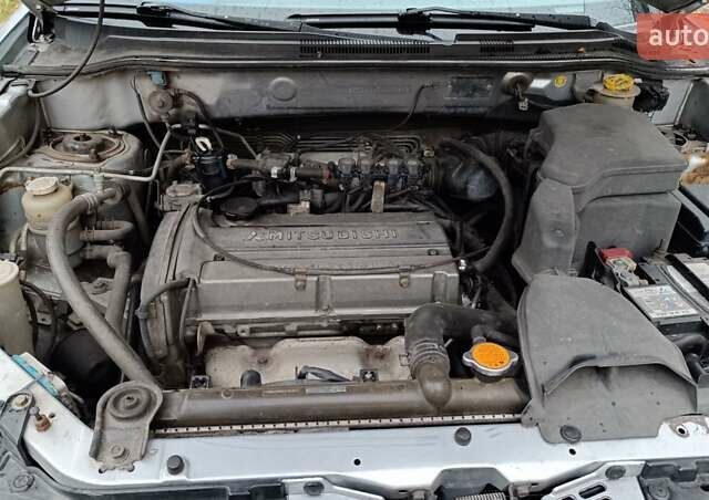 Сірий Міцубісі Аутлендер, об'ємом двигуна 2 л та пробігом 312 тис. км за 8300 $, фото 3 на Automoto.ua