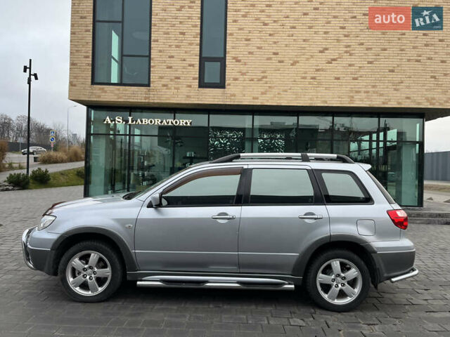 Серый Мицубиси Аутлендер, объемом двигателя 2.38 л и пробегом 180 тыс. км за 6000 $, фото 13 на Automoto.ua