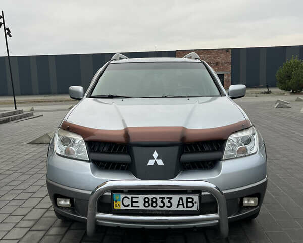 Серый Мицубиси Аутлендер, объемом двигателя 2.38 л и пробегом 180 тыс. км за 6000 $, фото 14 на Automoto.ua