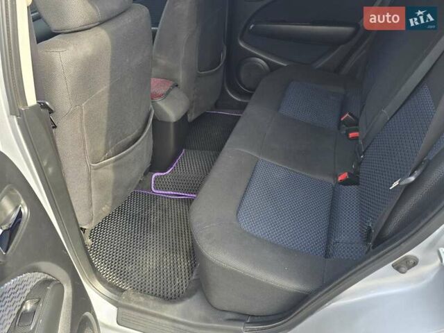 Серый Мицубиси Аутлендер, объемом двигателя 2.4 л и пробегом 243 тыс. км за 6999 $, фото 10 на Automoto.ua