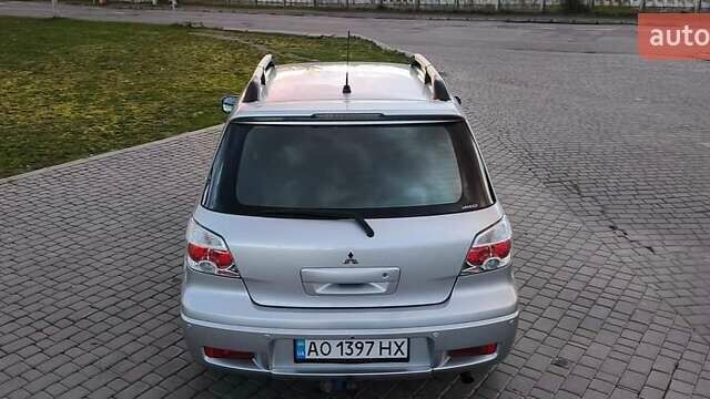 Серый Мицубиси Аутлендер, объемом двигателя 2.38 л и пробегом 228 тыс. км за 7900 $, фото 16 на Automoto.ua