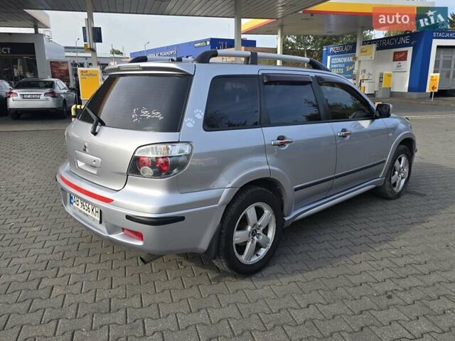 Серый Мицубиси Аутлендер, объемом двигателя 2.4 л и пробегом 243 тыс. км за 6999 $, фото 19 на Automoto.ua