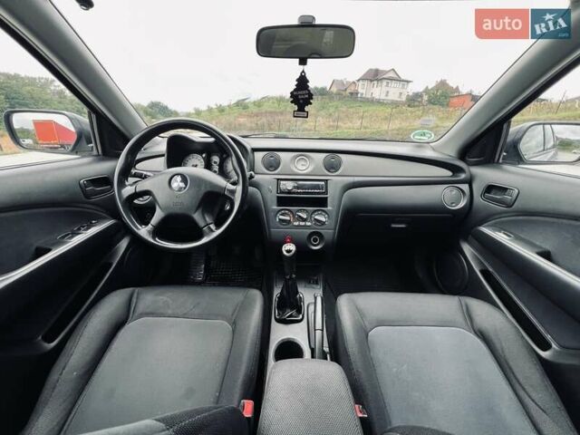 Сірий Міцубісі Аутлендер, об'ємом двигуна 2 л та пробігом 300 тис. км за 5150 $, фото 23 на Automoto.ua