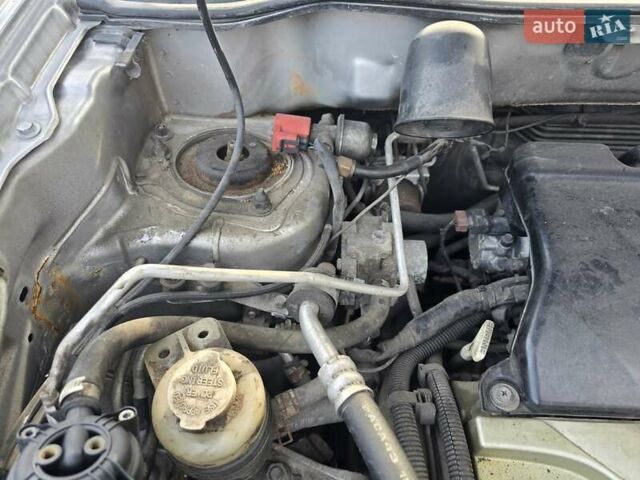 Серый Мицубиси Аутлендер, объемом двигателя 2.4 л и пробегом 243 тыс. км за 6999 $, фото 6 на Automoto.ua