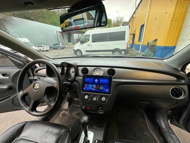Мицубиси Аутлендер 2006 в Хмельницком на Automoto.ua Серый Мицубиси Аутлендер, объемом двигателя 2.4 л и пробегом 240 тыс. км за 6500 $, фото 4 на Automoto.ua