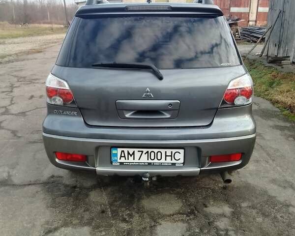 Серый Мицубиси Аутлендер, объемом двигателя 2 л и пробегом 154 тыс. км за 6500 $, фото 5 на Automoto.ua