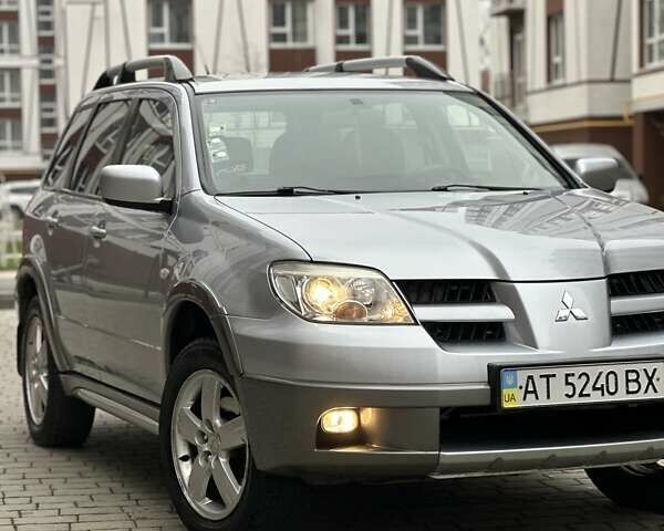 Сірий Міцубісі Аутлендер, об'ємом двигуна 2.4 л та пробігом 98 тис. км за 7199 $, фото 24 на Automoto.ua