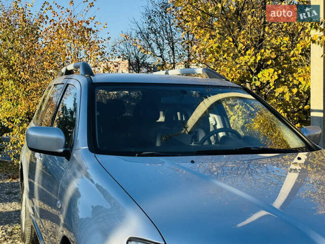 Серый Мицубиси Аутлендер, объемом двигателя 2 л и пробегом 233 тыс. км за 4999 $, фото 13 на Automoto.ua