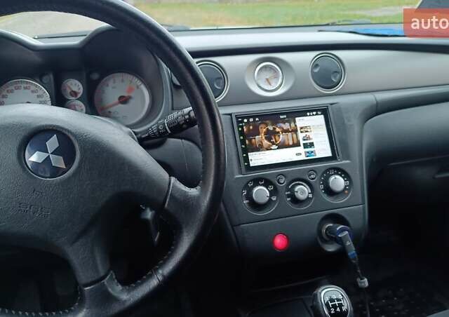 Сірий Міцубісі Аутлендер, об'ємом двигуна 2 л та пробігом 312 тис. км за 8300 $, фото 15 на Automoto.ua
