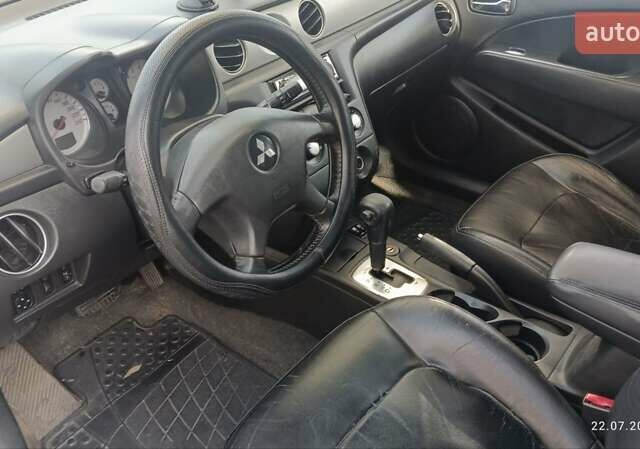 Серый Мицубиси Аутлендер, объемом двигателя 2.38 л и пробегом 600 тыс. км за 5700 $, фото 3 на Automoto.ua