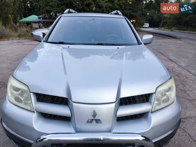 Мицубиси Аутлендер 2006 в Чернигове на Automoto.ua Серый Мицубиси Аутлендер, объемом двигателя 2.4 л и пробегом 147 тыс. км за 6900 $, фото 2 на Automoto.ua