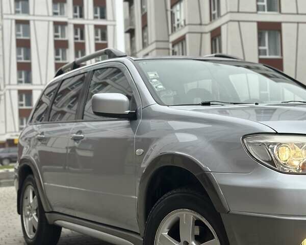 Сірий Міцубісі Аутлендер, об'ємом двигуна 2.4 л та пробігом 98 тис. км за 7199 $, фото 29 на Automoto.ua