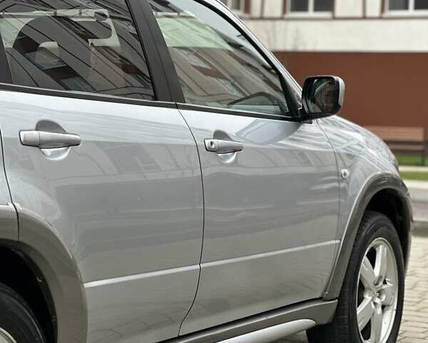 Сірий Міцубісі Аутлендер, об'ємом двигуна 2.4 л та пробігом 98 тис. км за 7199 $, фото 50 на Automoto.ua