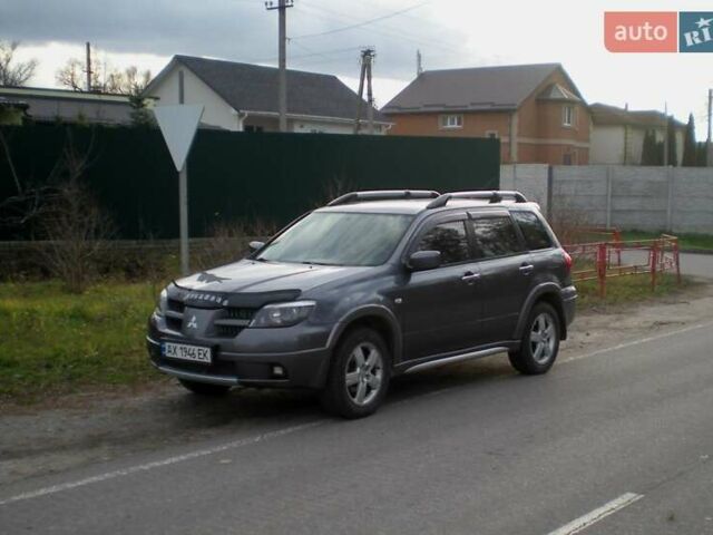 Серый Мицубиси Аутлендер, объемом двигателя 2.4 л и пробегом 235 тыс. км за 6500 $, фото 3 на Automoto.ua