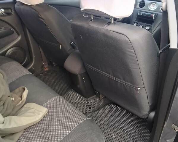 Серый Мицубиси Аутлендер, объемом двигателя 2 л и пробегом 154 тыс. км за 6500 $, фото 8 на Automoto.ua