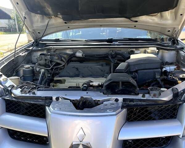 Серый Мицубиси Аутлендер, объемом двигателя 2.38 л и пробегом 260 тыс. км за 5799 $, фото 16 на Automoto.ua
