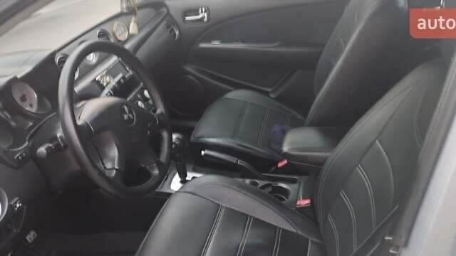 Серый Мицубиси Аутлендер, объемом двигателя 2.4 л и пробегом 261 тыс. км за 5700 $, фото 39 на Automoto.ua