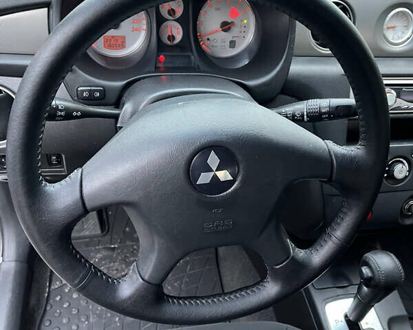 Серый Мицубиси Аутлендер, объемом двигателя 2.38 л и пробегом 180 тыс. км за 6000 $, фото 29 на Automoto.ua