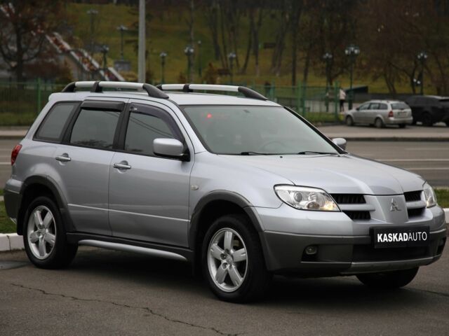 Серый Мицубиси Аутлендер, объемом двигателя 2.4 л и пробегом 171 тыс. км за 8200 $, фото 2 на Automoto.ua