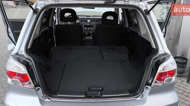 Серый Мицубиси Аутлендер, объемом двигателя 2.38 л и пробегом 228 тыс. км за 7900 $, фото 6 на Automoto.ua