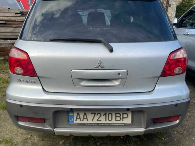 Серый Мицубиси Аутлендер, объемом двигателя 2.4 л и пробегом 127 тыс. км за 4400 $, фото 3 на Automoto.ua