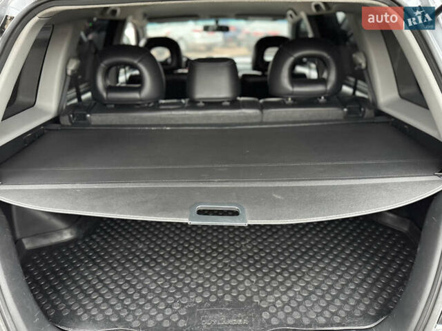 Серый Мицубиси Аутлендер, объемом двигателя 2.38 л и пробегом 204 тыс. км за 6990 $, фото 16 на Automoto.ua