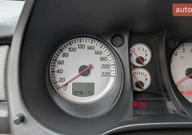 Серый Мицубиси Аутлендер, объемом двигателя 2 л и пробегом 226 тыс. км за 5500 $, фото 3 на Automoto.ua