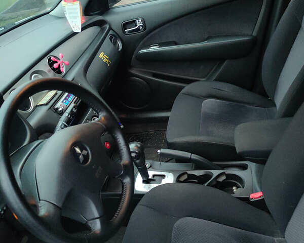 Сірий Міцубісі Аутлендер, об'ємом двигуна 2.4 л та пробігом 98 тис. км за 6800 $, фото 2 на Automoto.ua