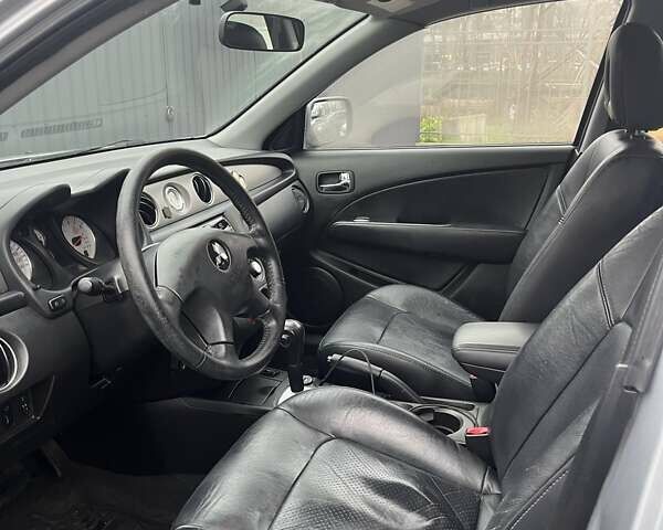 Серый Мицубиси Аутлендер, объемом двигателя 2.4 л и пробегом 179 тыс. км за 7000 $, фото 7 на Automoto.ua