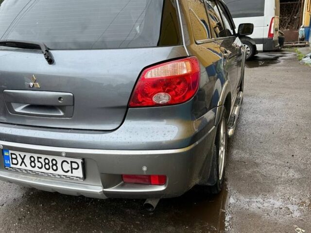 Мицубиси Аутлендер 2006 в Хмельницком на Automoto.ua Серый Мицубиси Аутлендер, объемом двигателя 2.4 л и пробегом 240 тыс. км за 6500 $, фото 15 на Automoto.ua