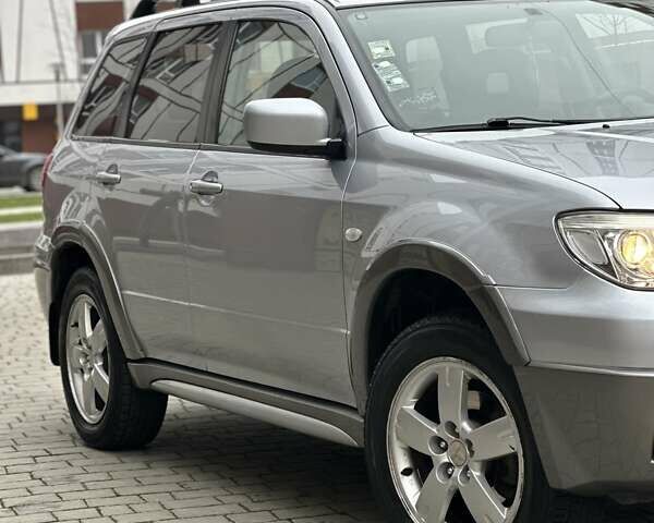 Сірий Міцубісі Аутлендер, об'ємом двигуна 2.4 л та пробігом 98 тис. км за 7199 $, фото 32 на Automoto.ua