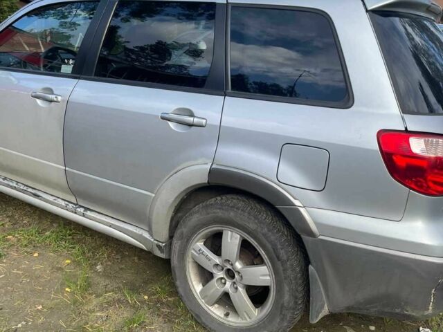 Серый Мицубиси Аутлендер, объемом двигателя 2.4 л и пробегом 127 тыс. км за 4400 $, фото 10 на Automoto.ua