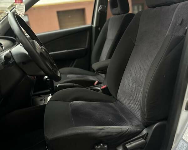 Сірий Міцубісі Аутлендер, об'ємом двигуна 2.4 л та пробігом 98 тис. км за 7199 $, фото 60 на Automoto.ua