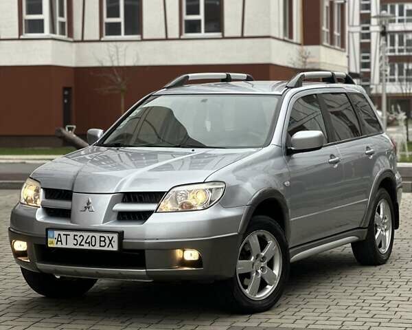 Сірий Міцубісі Аутлендер, об'ємом двигуна 2.4 л та пробігом 98 тис. км за 7199 $, фото 7 на Automoto.ua
