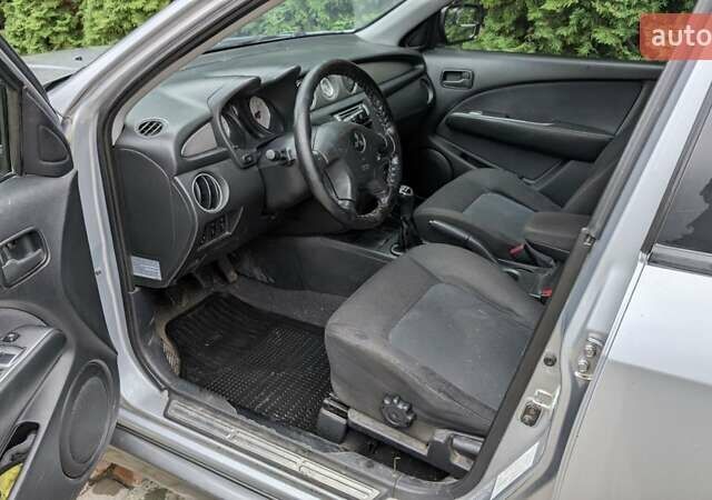 Серый Мицубиси Аутлендер, объемом двигателя 2 л и пробегом 226 тыс. км за 5500 $, фото 8 на Automoto.ua