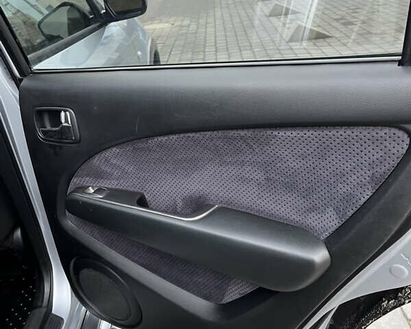 Серый Мицубиси Аутлендер, объемом двигателя 2.38 л и пробегом 180 тыс. км за 6000 $, фото 20 на Automoto.ua