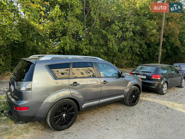 Серый Мицубиси Аутлендер, объемом двигателя 1.97 л и пробегом 260 тыс. км за 10900 $, фото 7 на Automoto.ua