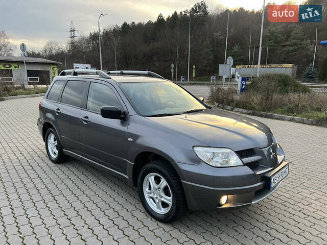 Серый Мицубиси Аутлендер, объемом двигателя 2 л и пробегом 196 тыс. км за 6450 $, фото 24 на Automoto.ua