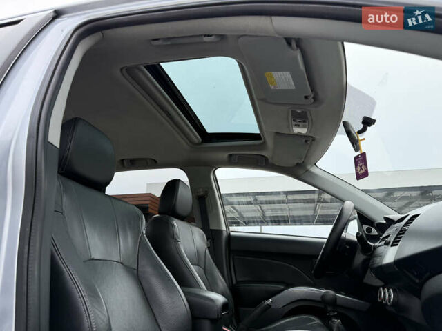 Серый Мицубиси Аутлендер, объемом двигателя 2 л и пробегом 299 тыс. км за 7750 $, фото 29 на Automoto.ua