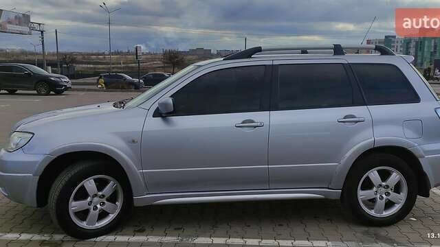Сірий Міцубісі Аутлендер, об'ємом двигуна 2.4 л та пробігом 170 тис. км за 6400 $, фото 15 на Automoto.ua