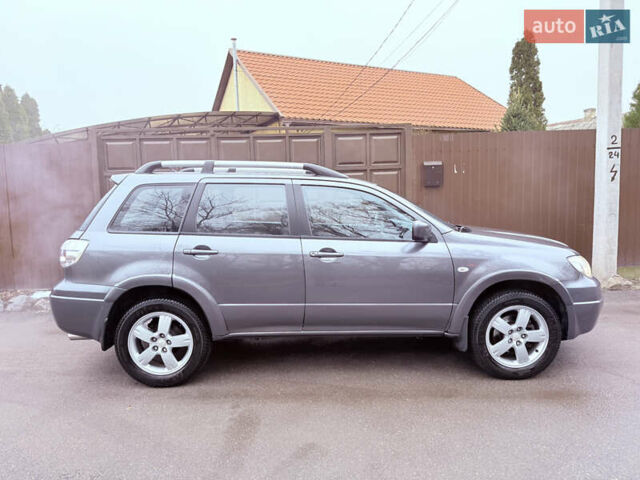 Серый Мицубиси Аутлендер, объемом двигателя 2.4 л и пробегом 240 тыс. км за 6900 $, фото 54 на Automoto.ua
