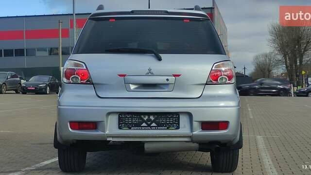 Сірий Міцубісі Аутлендер, об'ємом двигуна 2.4 л та пробігом 170 тис. км за 6400 $, фото 3 на Automoto.ua