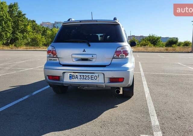 Сірий Міцубісі Аутлендер, об'ємом двигуна 2.4 л та пробігом 260 тис. км за 7300 $, фото 6 на Automoto.ua