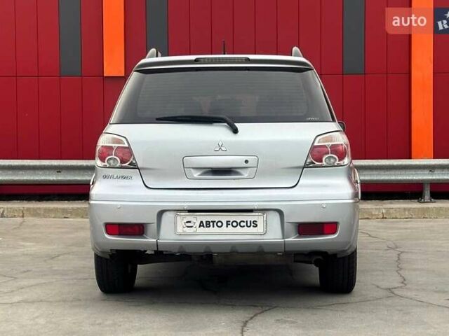 Серый Мицубиси Аутлендер, объемом двигателя 2.4 л и пробегом 245 тыс. км за 6790 $, фото 6 на Automoto.ua