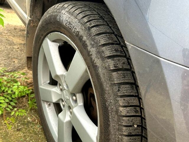 Сірий Міцубісі Аутлендер, об'ємом двигуна 2 л та пробігом 315 тис. км за 7999 $, фото 6 на Automoto.ua