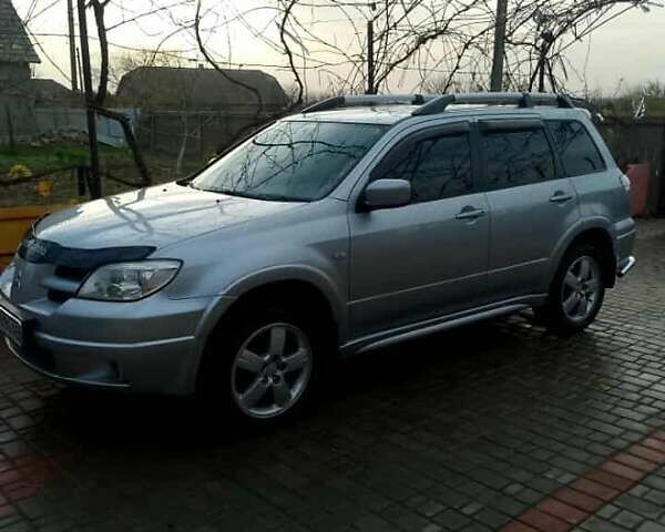 Сірий Міцубісі Аутлендер, об'ємом двигуна 2 л та пробігом 268 тис. км за 7500 $, фото 3 на Automoto.ua