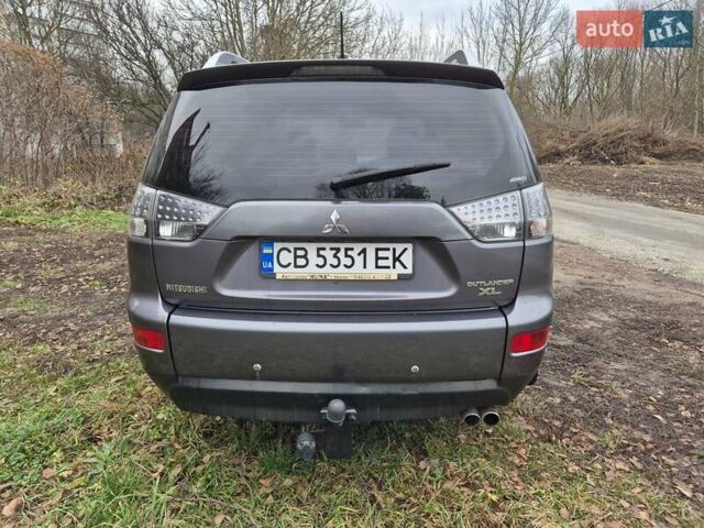 Сірий Міцубісі Аутлендер, об'ємом двигуна 3 л та пробігом 299 тис. км за 9000 $, фото 1 на Automoto.ua