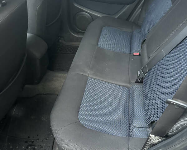 Серый Мицубиси Аутлендер, объемом двигателя 2 л и пробегом 200 тыс. км за 5900 $, фото 4 на Automoto.ua