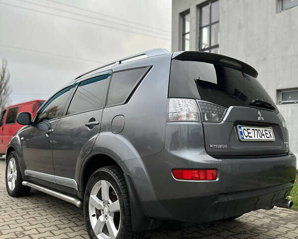 Сірий Міцубісі Аутлендер, об'ємом двигуна 2.36 л та пробігом 380 тис. км за 10000 $, фото 10 на Automoto.ua