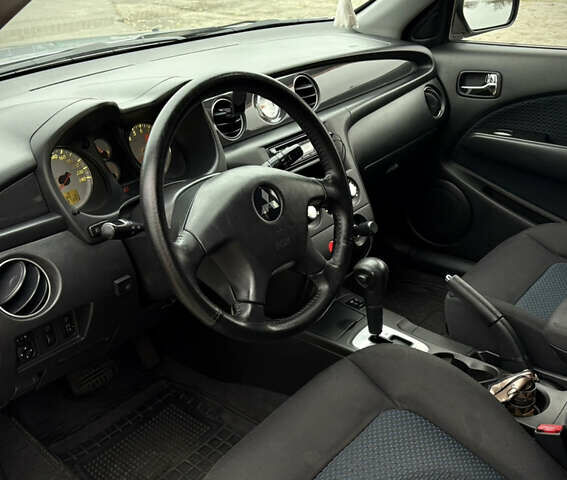 Серый Мицубиси Аутлендер, объемом двигателя 2.38 л и пробегом 238 тыс. км за 7450 $, фото 27 на Automoto.ua